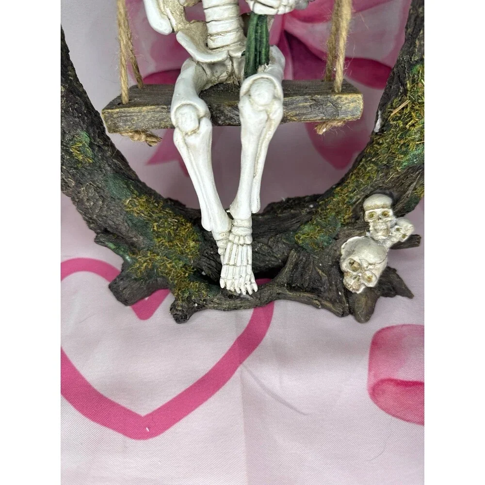 Viral Halloween Skeleton with Roses on a Tree Swing